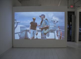 Video projection on white wall