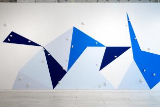 wall painting with geometric shapes in various blues