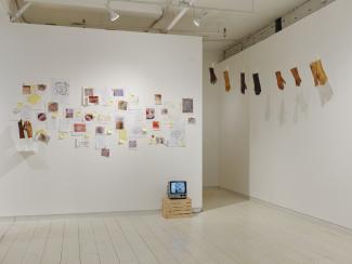 installation view of a gallery including video and installation