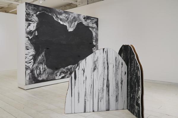 Wide shot of the gallery, featuring two of Tiffany Law's pieces.