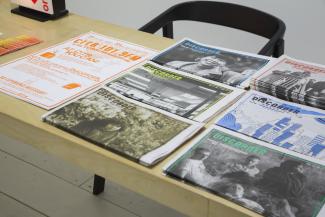 Publications spread out on a table