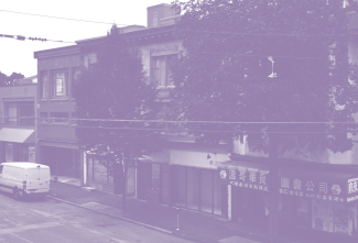 A purple-toned photograph of Access Gallery's exterior, viewed from above