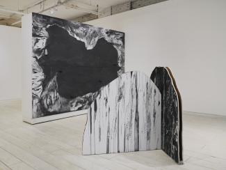 Wide shot of the gallery, featuring two of Tiffany Law's pieces.
